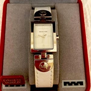 Michael Kors Ladies Watch, white leather band, new batteries.